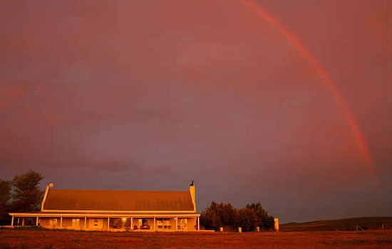 Great sunset with rainbow at RiverBend Lodge